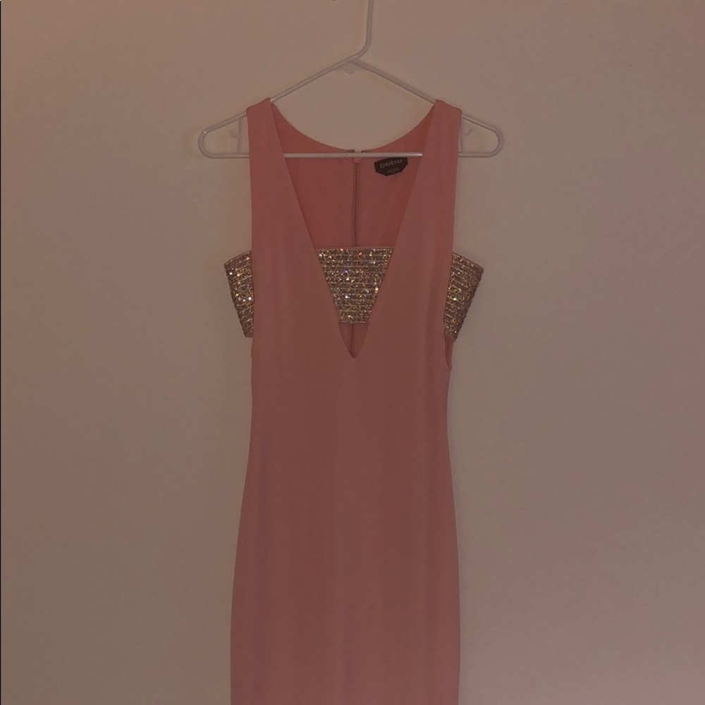 Bebe dress with sparkle band and cut outs.